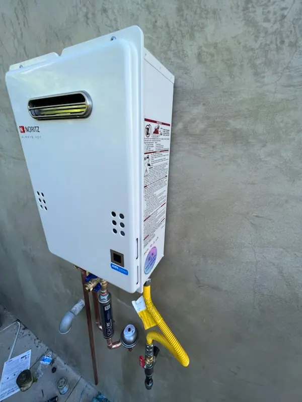 Tankless water heater installation for Champlain homes
